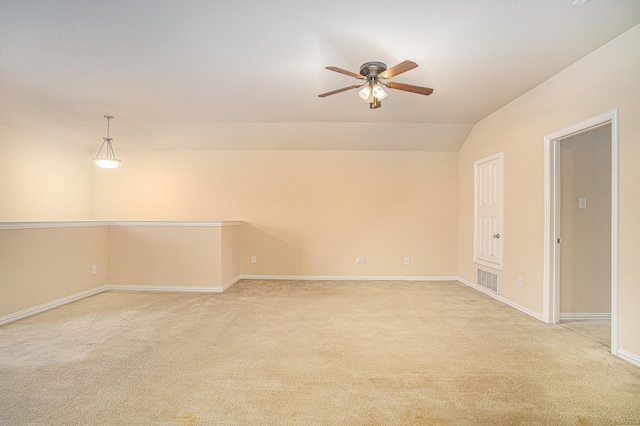 4216 Bridgestone Dr, Fort Worth, TX 76123 - empty room with ceiling fan, light carpet, vaulted ceiling, and baseboards
