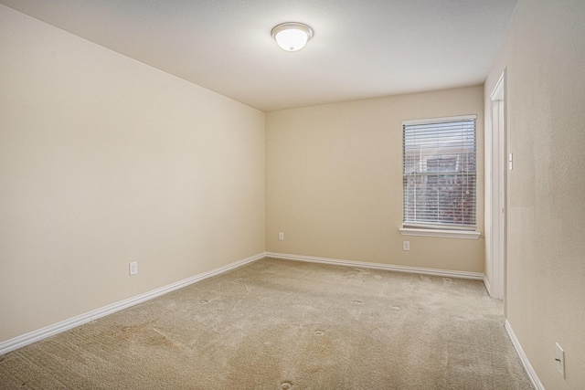 view of carpeted spare room