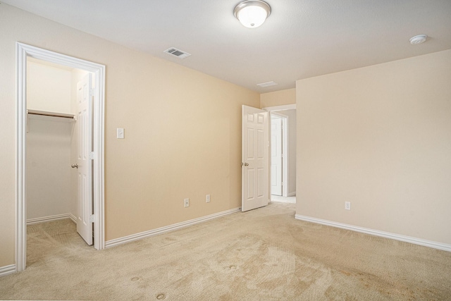 4216 Bridgestone Dr, Fort Worth, TX 76123 - unfurnished bedroom with light colored carpet, a spacious closet, and baseboards