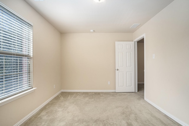 4216 Bridgestone Dr, Fort Worth, TX 76123 - spare room with light carpet, healthy amount of natural light, and baseboards