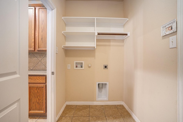 4216 Bridgestone Dr, Fort Worth, TX 76123 - laundry room featuring gas dryer hookup, electric dryer hookup, hookup for a washing machine, light tile patterned flooring, and baseboards