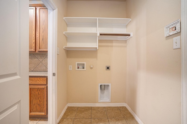 laundry area with electric dryer hookup, washer hookup, hookup for a gas dryer, and light tile patterned floors