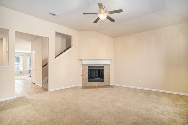 4216 Bridgestone Dr, Fort Worth, TX 76123 - unfurnished living room featuring carpet, a fireplace, a ceiling fan, lofted ceiling, and baseboards