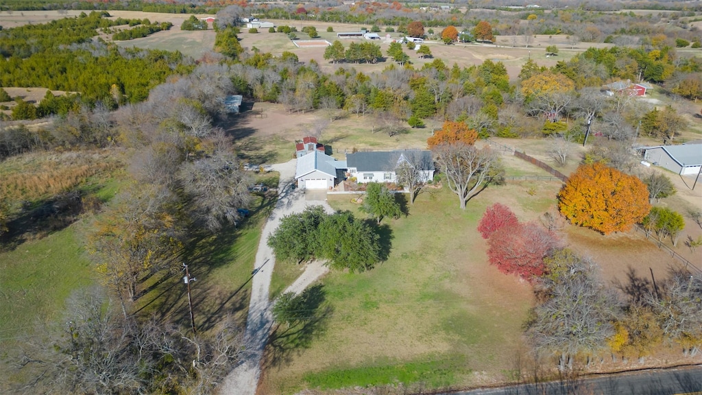 birds eye view of property featuring a rural view