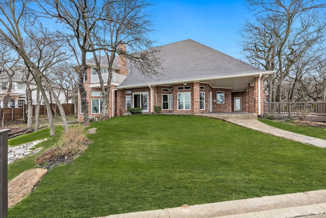 view of front of home featuring a carport and a front lawn