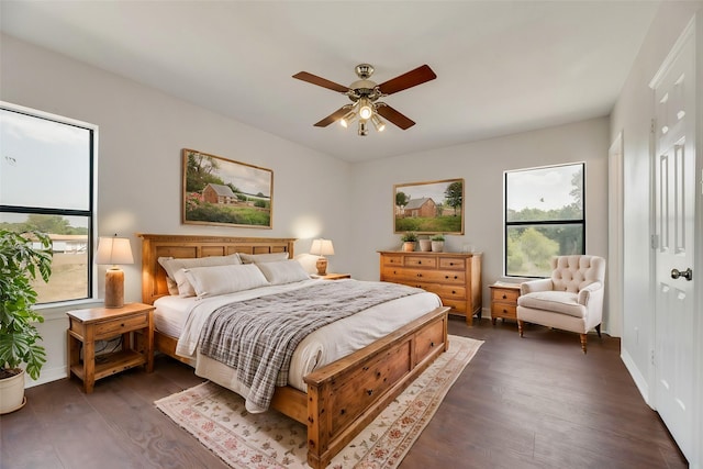 bedroom featuring dark wood-type flooring and ceiling fan