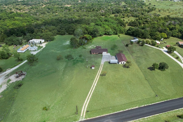 birds eye view of property with a rural view