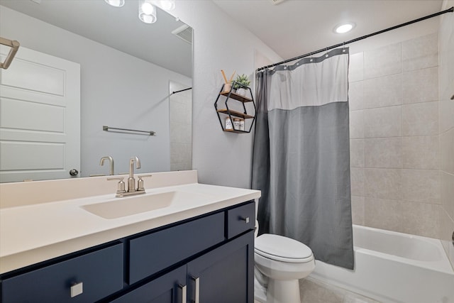 full bathroom featuring vanity, toilet, and shower / bath combo with shower curtain