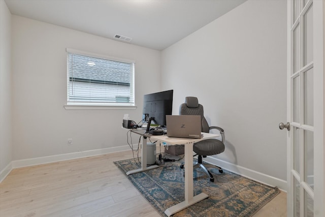 office space featuring light wood-type flooring