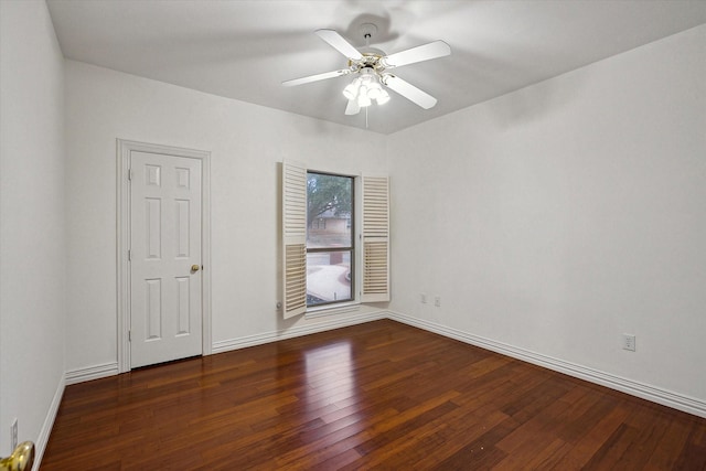 unfurnished room with dark wood-type flooring and ceiling fan