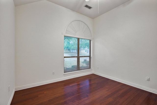 empty room featuring hardwood / wood-style floors