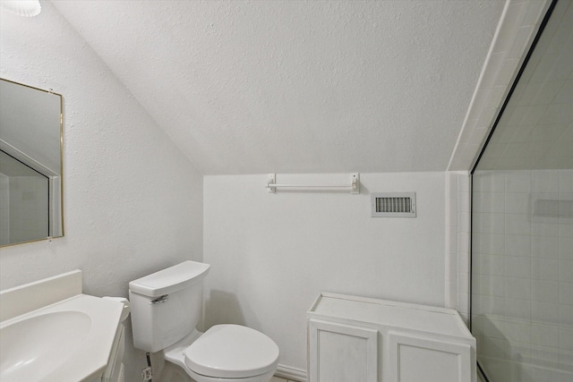 bathroom with walk in shower, lofted ceiling, toilet, a textured ceiling, and vanity