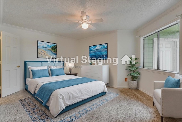 bedroom featuring ceiling fan, ornamental molding, a textured ceiling, and carpet flooring