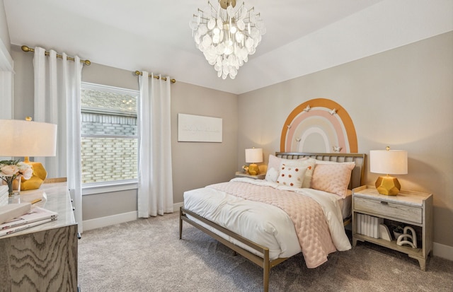 bedroom featuring carpet and an inviting chandelier