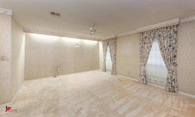 unfurnished room with ceiling fan