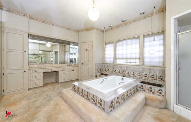 bathroom featuring vanity and plus walk in shower