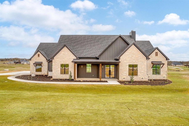 view of front of home with a front lawn