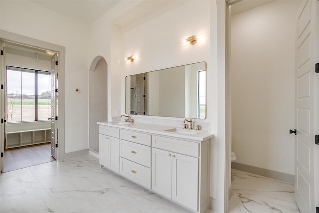 bathroom with vanity and toilet