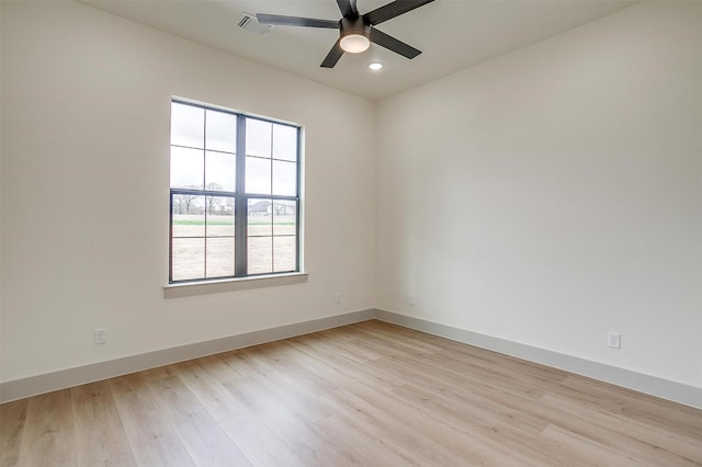 unfurnished room with light hardwood / wood-style floors and ceiling fan