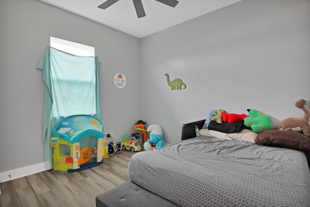 bedroom featuring ceiling fan and light hardwood / wood-style floors