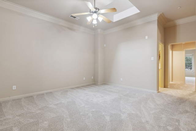 carpeted empty room with ornamental molding and ceiling fan