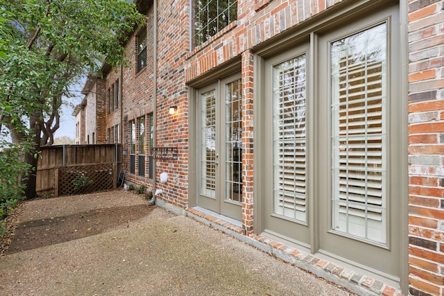 doorway to property featuring a patio