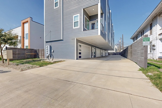 view of property exterior with a garage