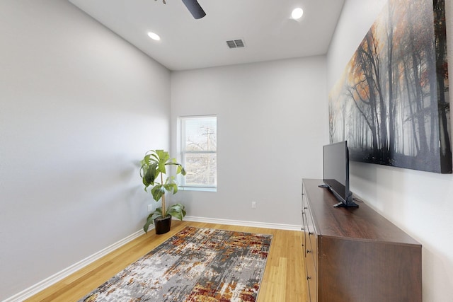 office space featuring hardwood / wood-style floors and ceiling fan