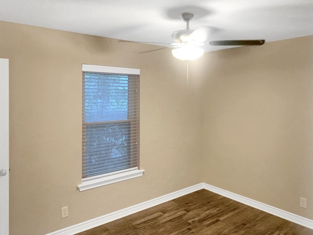 empty room featuring ceiling fan and hardwood / wood-style floors