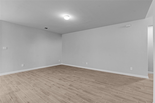 empty room featuring light hardwood / wood-style floors