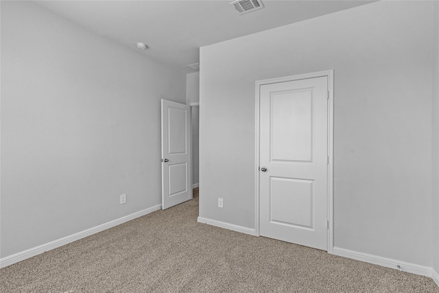 unfurnished bedroom with carpet