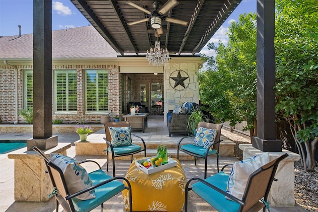 view of patio featuring ceiling fan and outdoor lounge area