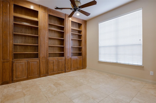 spare room featuring recessed lighting, ceiling fan, and baseboards