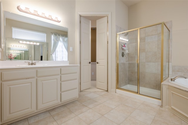 bathroom featuring tile patterned floors, a shower stall, vanity, and a bath