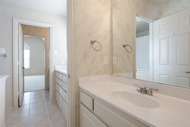 full bathroom with vanity and tile patterned floors