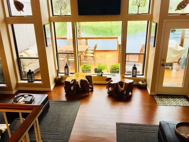 sunroom / solarium featuring plenty of natural light