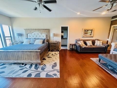 bedroom featuring wood finished floors and a ceiling fan