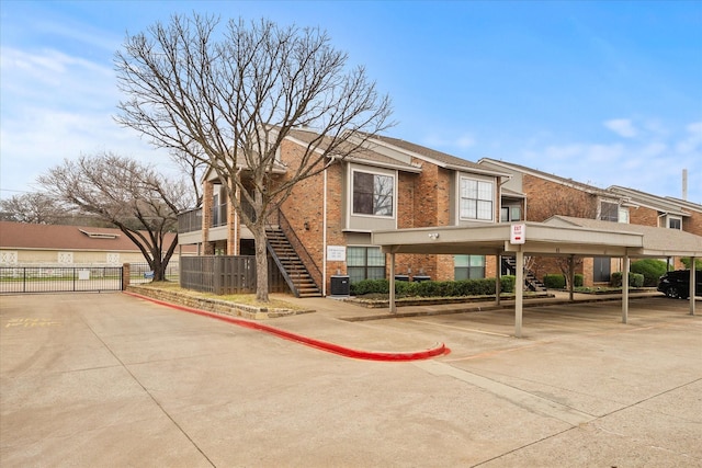 exterior space featuring central AC unit