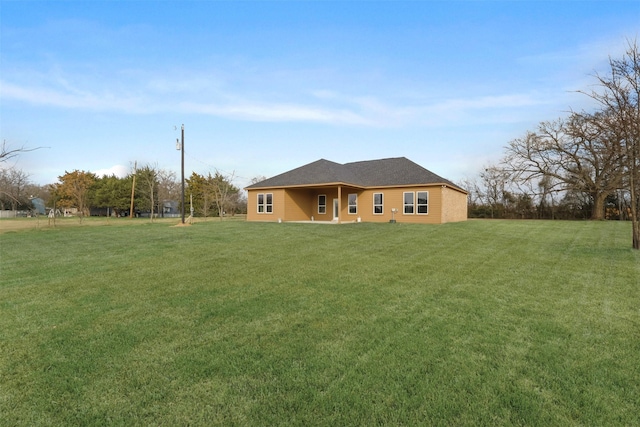 exterior space featuring a lawn