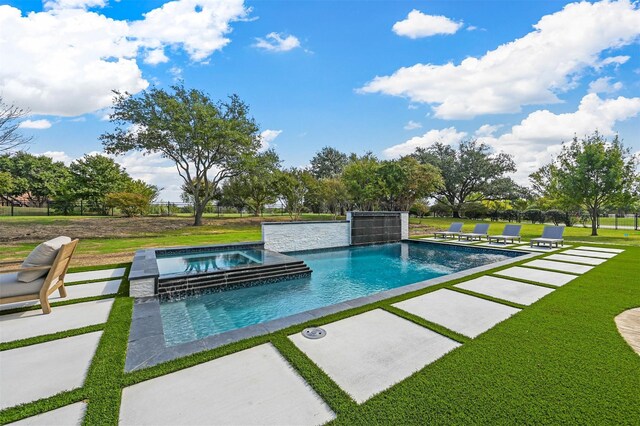 view of pool with a yard and a patio