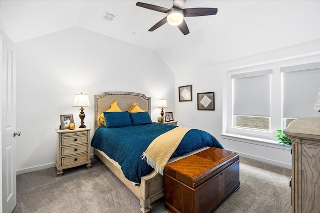 carpeted bedroom with ceiling fan and lofted ceiling