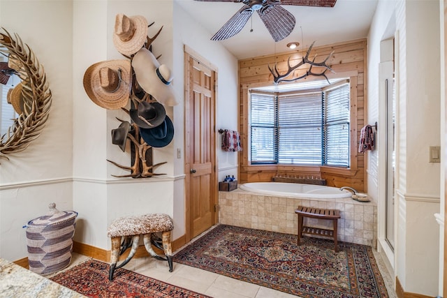 bathroom with independent shower and bath and tile patterned floors