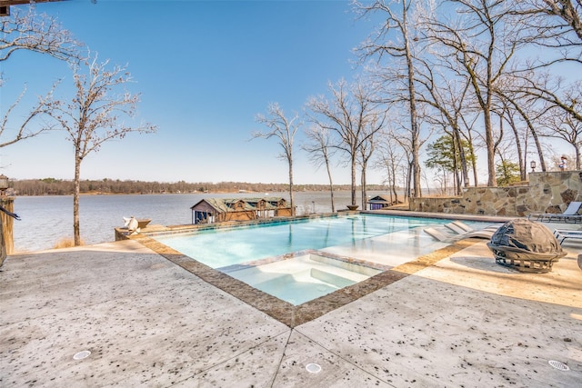 view of swimming pool with an in ground hot tub, a patio, and a water view