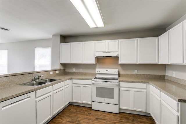 kitchen featuring white cabinetry, dark hardwood / wood-style flooring, sink, and white appliances