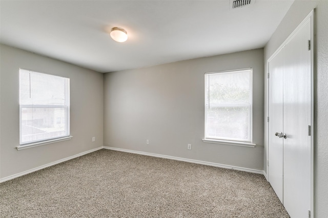 view of carpeted spare room