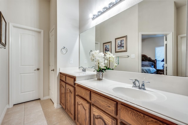 bathroom featuring tile patterned floors and vanity