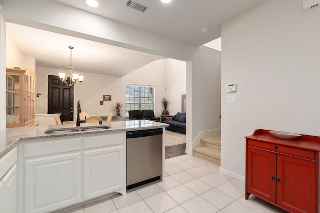 kitchen featuring light tile patterned floors, sink, a notable chandelier, white cabinetry, and stainless steel dishwasher