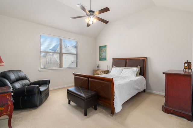 carpeted bedroom featuring vaulted ceiling and ceiling fan