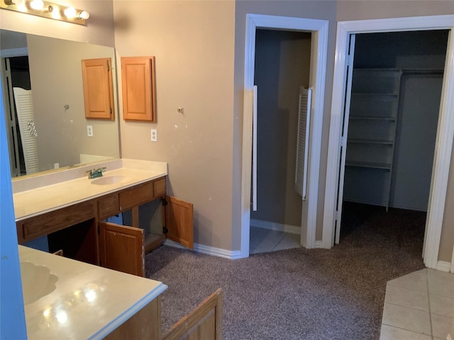 bathroom with vanity and tile patterned floors