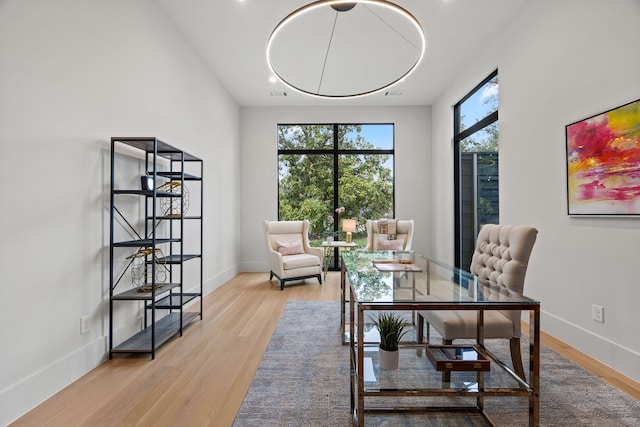 office with light hardwood / wood-style floors